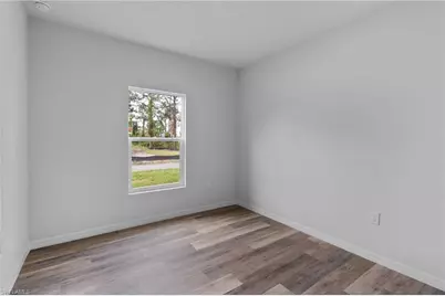 945 Butler St E, Lehigh Acres, FL 33974 - Photo 16