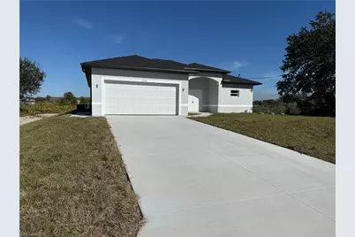 2704 70th St W, Lehigh Acres, FL 33971 - Photo 1