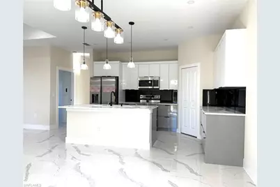 3115 26th St SW, Lehigh Acres, FL 33976 - Photo 6