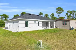 1040 Pine Cove Dr, Lehigh Acres, FL 33974 - Photo 30