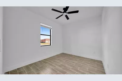 704 Homer Ave S #1, Lehigh Acres, FL 33973 - Photo 14