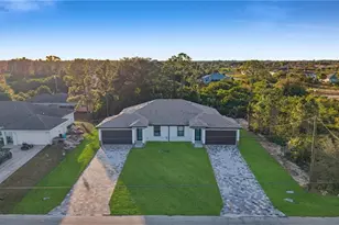704 Homer Ave S, Lehigh Acres, FL 33973 - Photo 30