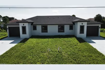 123 Ichabod Ave, Lehigh Acres, FL 33973 - Photo 1