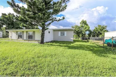 305 Bougainvillea Rd W, Lehigh Acres, FL 33936 - Photo 2