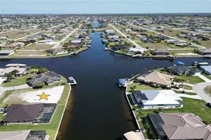 909 NW 36th Pl, Cape Coral, FL 33993 - Photo 1