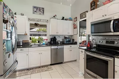 1985 Coral Point Dr, Cape Coral, FL 33990 - Photo 8