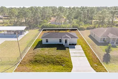 1064 Bells St E, Lehigh Acres, FL 33974 - Photo 1