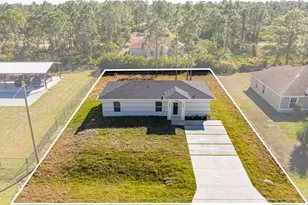 1064 Bells St E, Lehigh Acres, FL 33974 - Photo 1
