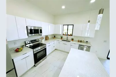 1027 Kismet Pkwy W, Cape Coral, FL 33993 - Photo 6