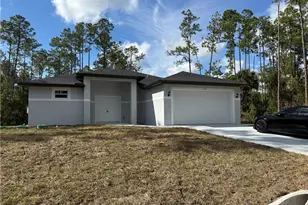 106 Moore Ave S, Lehigh Acres, FL 33974 - Photo 2