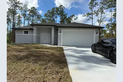 106 Moore Ave S, Lehigh Acres, FL 33974 - Photo 1