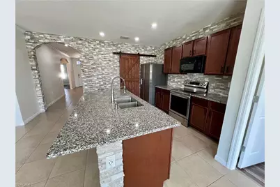 10293 Silver Pond Ln, Lehigh Acres, FL 33936 - Photo 18