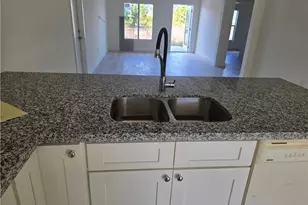 2615 32nd St SW, Lehigh Acres, FL 33976 - Photo 10