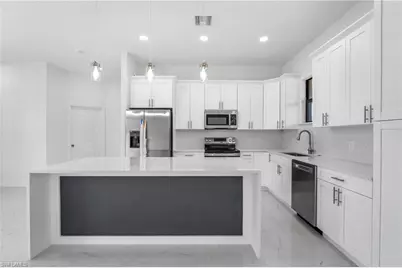 2602 73rd St W, Lehigh Acres, FL 33971 - Photo 6