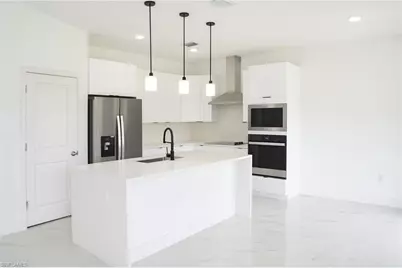 3813 25th St SW, Lehigh Acres, FL 33976 - Photo 2