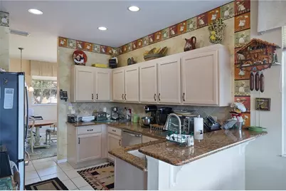 25051 Ballycastle Ct #201, Bonita Springs, FL 34134 - Photo 18