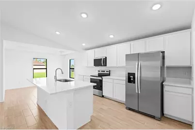 1321 NW 15th Ter, Cape Coral, FL 33993 - Photo 6