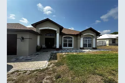 3315 37th St SW, Lehigh Acres, FL 33976 - Photo 1