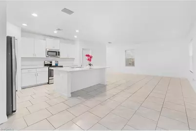 12230 Dakota Ridge Pl, Lehigh Acres, FL 33974 - Photo 6