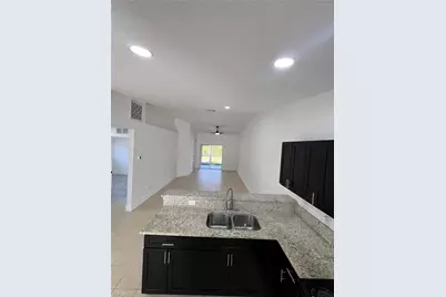 1414 W 12th St, Lehigh Acres, FL 33972 - Photo 2