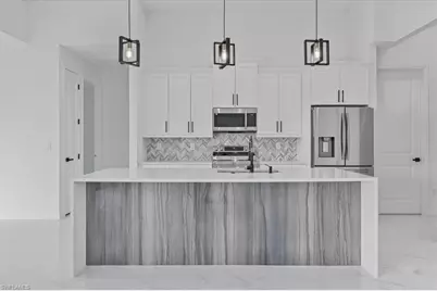 1310 NE 7th Pl, Cape Coral, FL 33909 - Photo 12