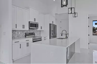 1310 NE 7th Pl, Cape Coral, FL 33909 - Photo 14