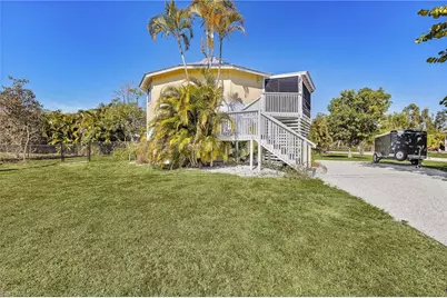 7250 Caloosa Dr, Bokeelia, FL 33922 - Photo 1