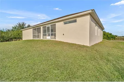 1402 Fred Ave S, Lehigh Acres, FL 33976 - Photo 2