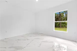 835 Oakridge Ave S, Lehigh Acres, FL 33974 - Photo 18