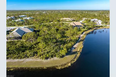 6049 Calusa Ridge Trl, Bokeelia, FL 33922 - Photo 18