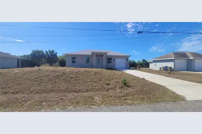 402 Harrison Dr, Lehigh Acres, FL 33936 - Photo 1