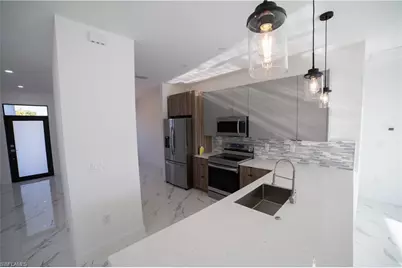 1208 NW 25th Pl, Cape Coral, FL 33993 - Photo 4