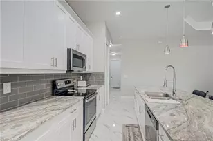 3309 30th St SW, Lehigh Acres, FL 33976 - Photo 8
