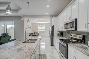 3309 30th St SW, Lehigh Acres, FL 33976 - Photo 6