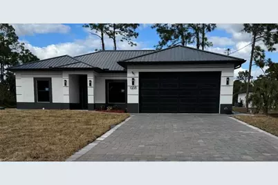 1235 Count St E St E, Lehigh Acres, FL 33974 - Photo 1
