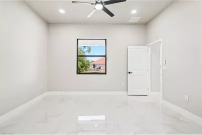 2606 25th St SW, Lehigh Acres, FL 33976 - Photo 18