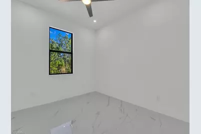 1033 Bassinger Ave S, Lehigh Acres, FL 33974 - Photo 24