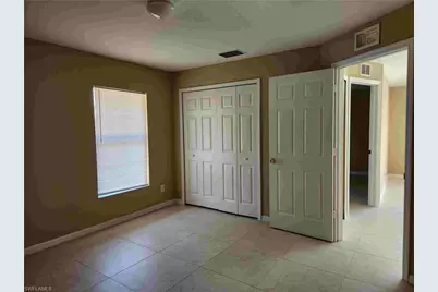 711 Jack Ave S, Lehigh Acres, FL 33973 - Photo 10