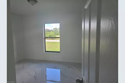 2707 30th St SW, Lehigh Acres, FL 33976 - Photo 12
