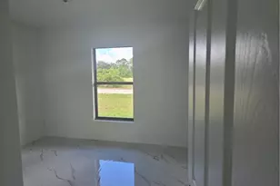 2707 30th St SW, Lehigh Acres, FL 33976 - Photo 12