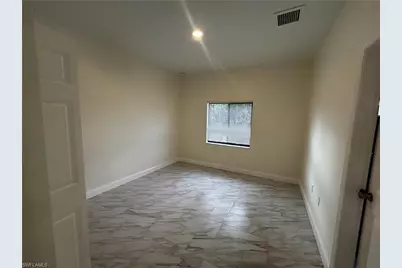 719 Harry Ave S, Lehigh Acres, FL 33973 - Photo 6