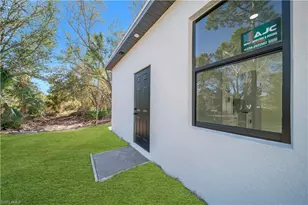 706 Theodore Vail St E, Lehigh Acres, FL 33974 - Photo 28