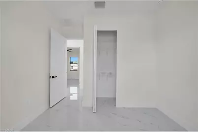 706 Theodore Vail St E, Lehigh Acres, FL 33974 - Photo 22
