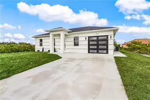706 Theodore Vail St E, Lehigh Acres, FL 33974 - Photo 2
