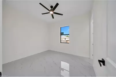 706 Theodore Vail St E, Lehigh Acres, FL 33974 - Photo 16
