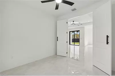 369 Woodburn Dr, Lehigh Acres, FL 33972 - Photo 12