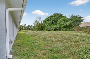 848 Holmes Ave, Lehigh Acres, FL 33974 - Photo 16