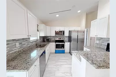 1111 NW 19th Ter, Cape Coral, FL 33993 - Photo 6