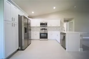 430 Burrstone Dr, Lehigh Acres, FL 33974 - Photo 2