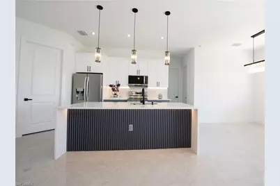 3115 2nd St SW, Lehigh Acres, FL 33976 - Photo 8